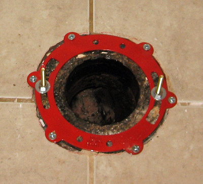 What does a toilet flange repair ring do?