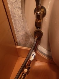 kohler Tee with one hose dripping.jpg